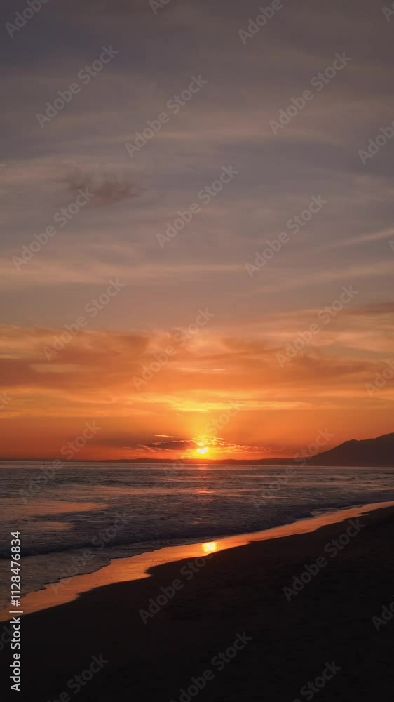 Gentle ocean waves washing ashore during a golden hour sunset, with soft pastel hues in the sky and water reflections creating a serene scene Gentle ocean waves washing ashore during a golden hour sunset, with soft pastel hues in the sky and water reflections creating a serene scene