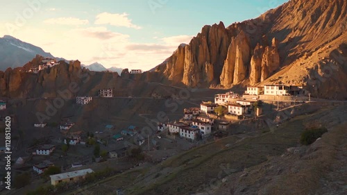 Landscape shot of Dhankar Monastery during the sunset at Dhankar in Spiti Valley, Himachal Pradesh, India. Village built on a cliff on the Himalayan mountain ranges in India. Old Monastery in Spiti. 