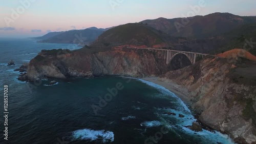 Bixby Bridge Big Creek Pfeiffer Canyon Santa Lucia Mountains Big Sur California aerial drone sunset birds Pacific Ocean Coastal Highway windy road rugged coastline Carmel Sea Monterey forward motion