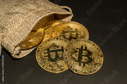 Cryptocurrencies in a sack on a black background