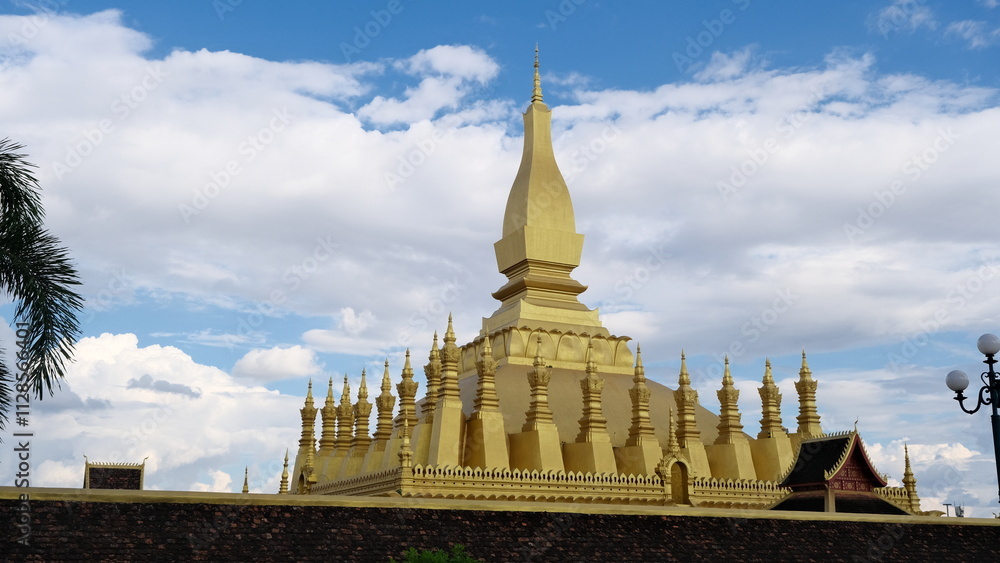 Naklejka premium Pha That Luang or Loka Chulamani Stupa is the largest and most beautiful stupa in the Kingdom of Laos.