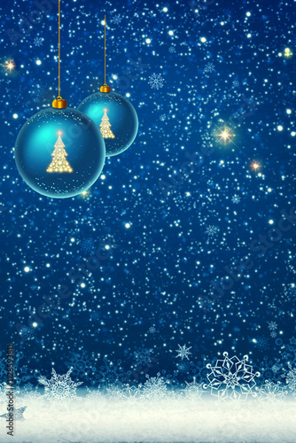 Merry Christmas background with white falling snow and blue baubles .