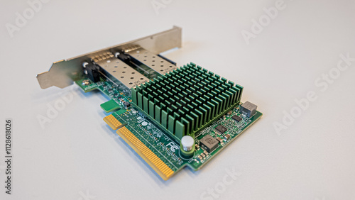 Computer graphics card with cooling system on display in bright studio lighting