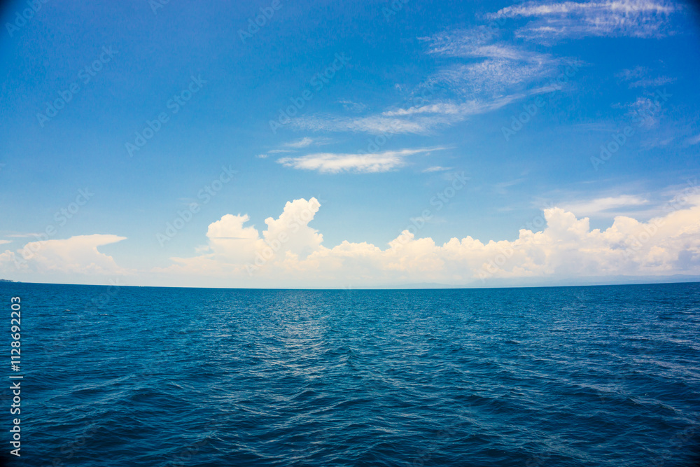 Deep blue sea ocean sunny sky with cloud nature landscape Deep blue sea ocean sunny sky with cloud nature landscape