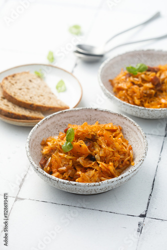 Stewed sauerkraut with tomato	 photo