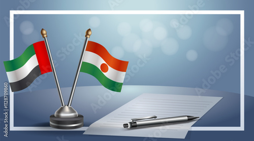 United Arab Emirate and Niger National flags on small table with bokeh background, cooperative relationship