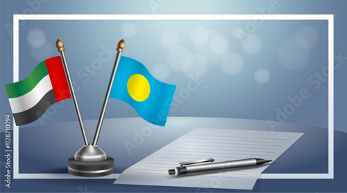United Arab Emirate and Palau National flags on small table with bokeh background, cooperative relationship