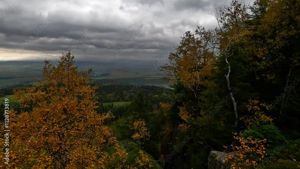 Panorama of a mountain valley in autumn from the peak of Szczeliniec Wielki, Stolowe Mountains, Poland Panorama of a mountain valley in autumn from the peak of Szczeliniec Wielki, Stolowe Mountains, Poland