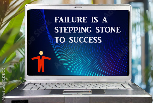 laptop with inspirational quote