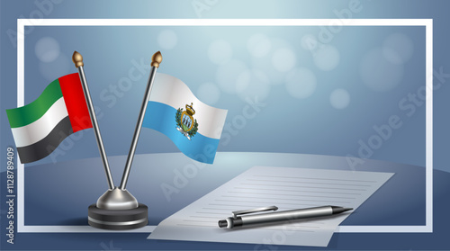 United Arab Emirate and San Marino National flags on small table with bokeh background, cooperative relationship
