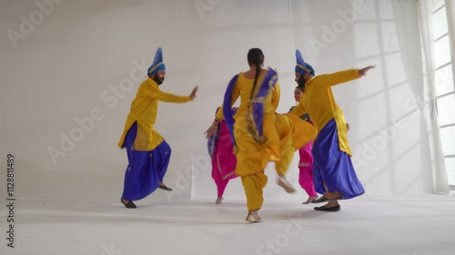 Sikh People performing bhangra during Baisakhi celebration