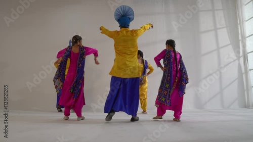 Sikh People performing bhangra during Baisakhi celebration