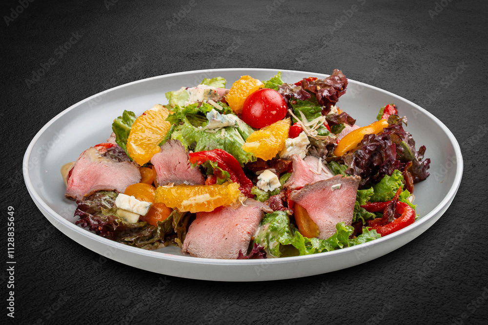 Roast beef salad with cherry tomatoes and orange Roast beef salad with cherry tomatoes and orange