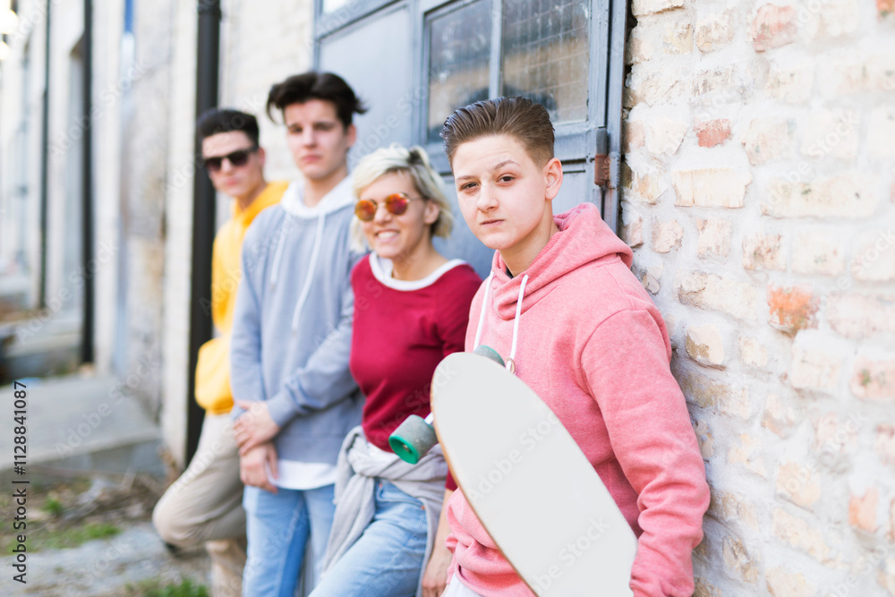 Group of young adults spending time outdoors Group of young adults spending time outdoors