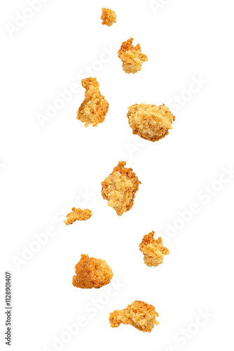 Fotografie Falling bread crumbs. Isolated on a transparent background.