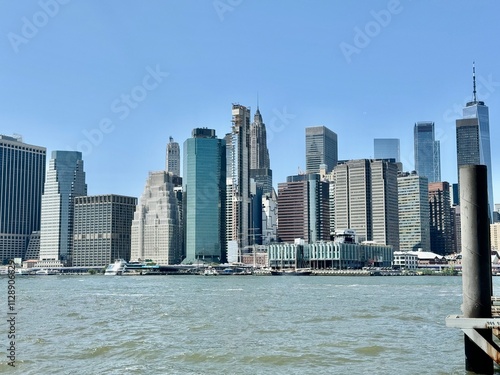 Midtown manhattan skyscraper skyline along east river from brooklyn side