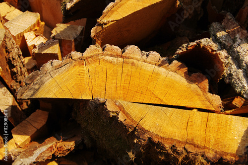 Wallpaper Mural Stack of pine scraps from logs in a sawmill yard. Lumber for construction or material for firewood Torontodigital.ca