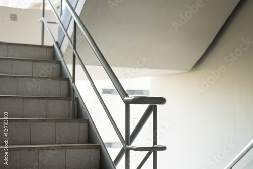 Bilde på lerret Building apartment stairway with handrail, using for emergency escape route