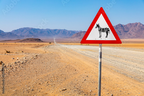 Caution Zebra, wildlife road sign in the NamibRand Nature Reserve in Namibia, Africa