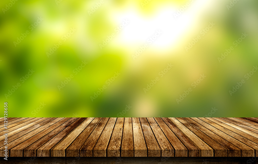 Wood floor with blurred trees of nature park background and summer season, product display montage Wood floor with blurred trees of nature park background and summer season, product display montage