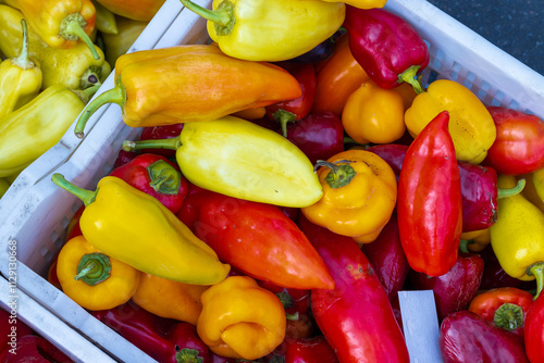 raw peppers vegetables fresh product food concept on rustic village fair market retail place box counter photo