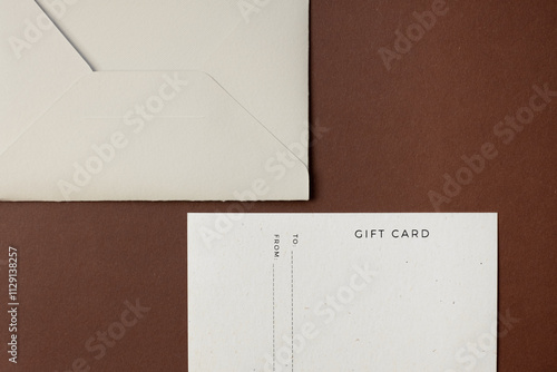 Gift card in envelope on brown