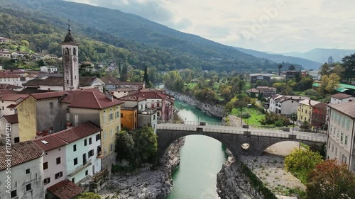 Аerial view of river Soca in Slovenia - Kanal on the Soca (Kanal ob Soci) village with a beautiful stone arch bridge and old buildings