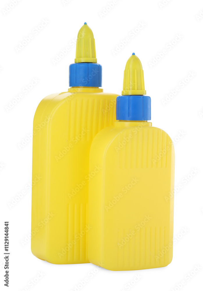 Bottles of glue with caps isolated on white Bottles of glue with caps isolated on white