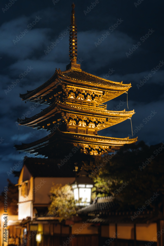 View of Gion district street, Kyoto, Higashiyama-ku, Japan, night illumination of Ninnenzaka and Sannenzaka streets, with old wooden tea houses Hokanji temple and Yasaka Pagoda, Gion geisha quarter View of Gion district street, Kyoto, Higashiyama-ku, Japan, night illumination of Ninnenzaka and Sannenzaka streets, with old wooden tea houses Hokanji temple and Yasaka Pagoda, Gion geisha quarter