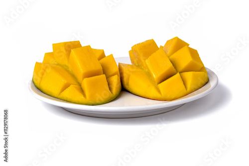 Ripe mangos sliced cut to cubes on a white background, top-side view photo