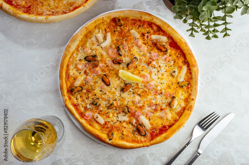 traditional Italian pizza on a white plate