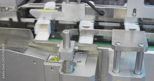 Pharmaceutical manufacturing machine packaging medicine boxes