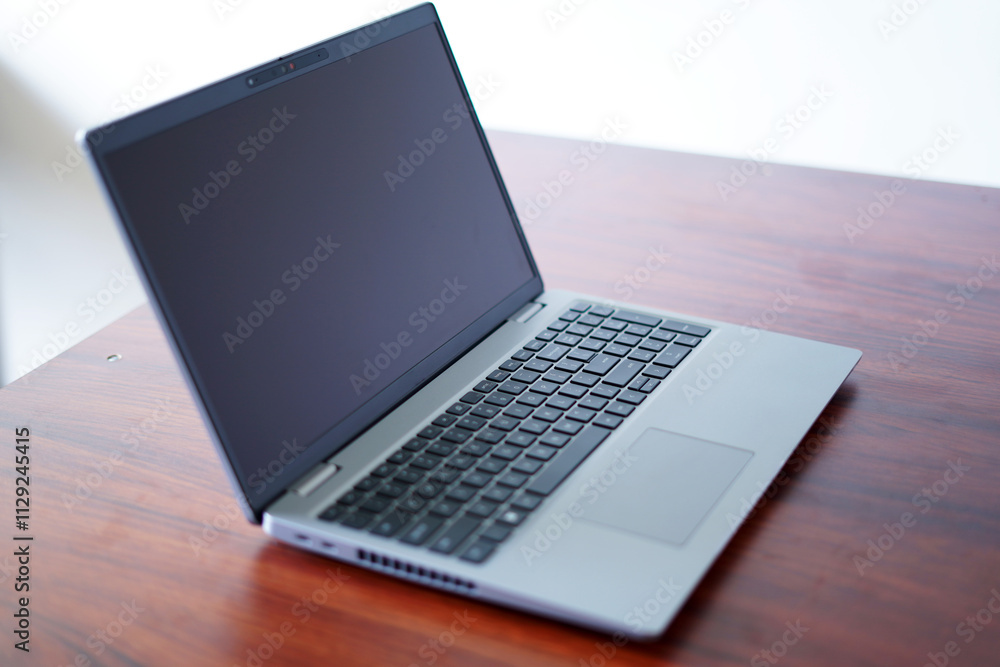 laptop on table close up image laptop on table close up image