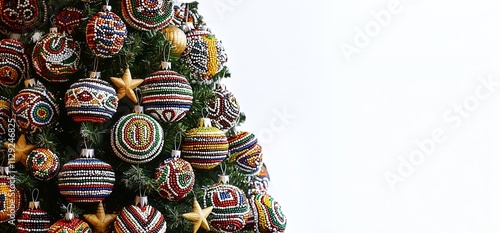 christmas tree colorful ndebele inspired with geometric patterns and traditional african tribal art decorations on light background photo