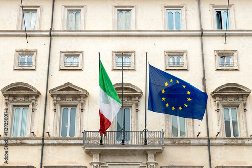 Palazzo Chigi, seat of the Italian government, with Italy and EU flags in Rome