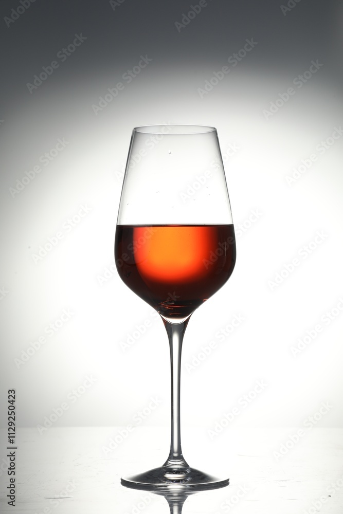 Tasty wine in glass on light background Tasty wine in glass on light background