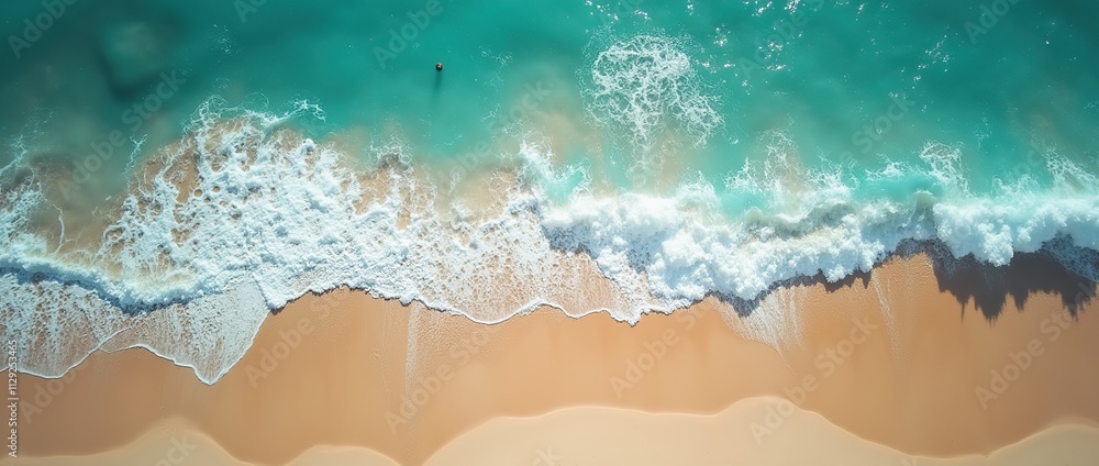 Fototapeta premium Gentle waves lapping shoreline tropical beach , sunny environment.