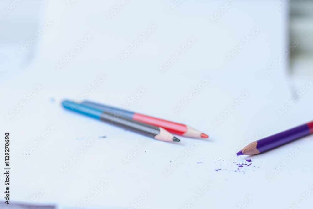 colored pencil on white paper, sawdust from a sharpener and colored pencils colored pencil on white paper, sawdust from a sharpener and colored pencils