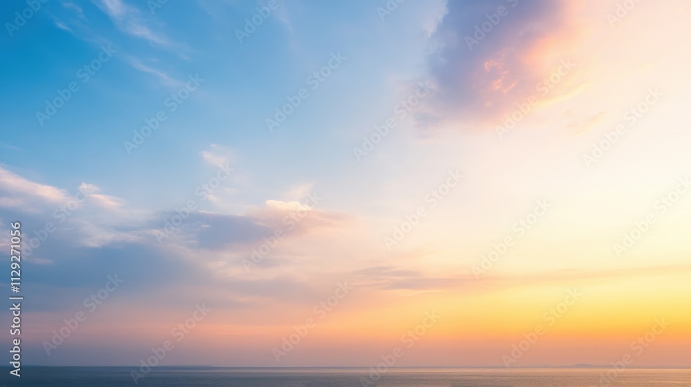 Obraz premium Beautiful Sunset Over Calm Ocean Waters with a Gradient Sky Transitioning from Blue to Warm Orange and Pink Hues, Perfect for Nature Lovers and Tranquil Scenery Enthusiasts