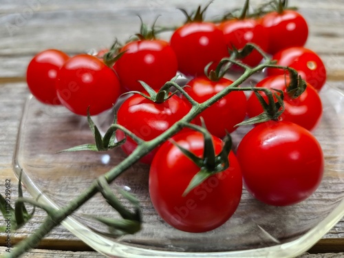 Ripe cherry tomatoes on a plate. high quality photos.