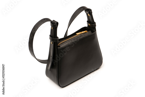 Black small leather cross body bag isolated on a white background.