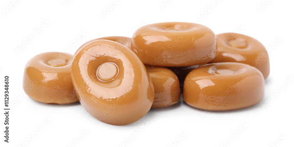 Tasty hard toffee candies isolated on white Tasty hard toffee candies isolated on white
