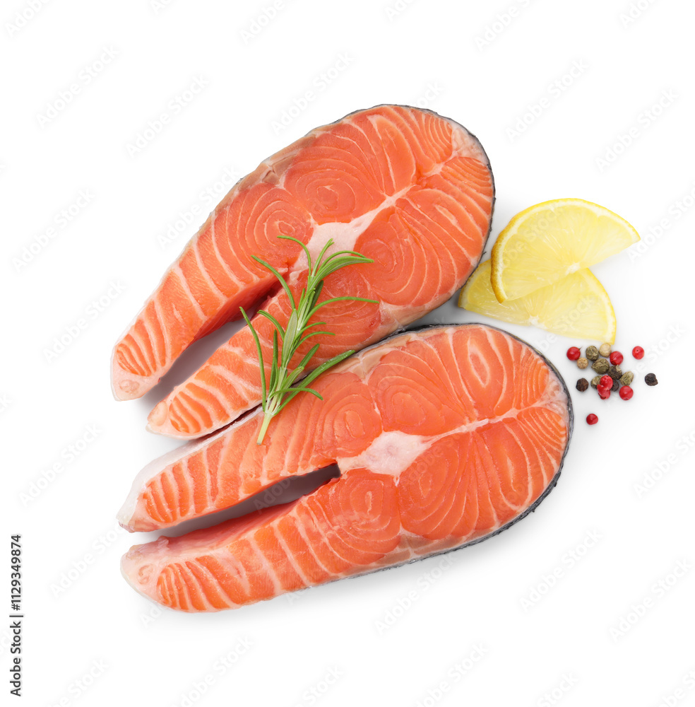 Steaks of fresh raw salmon and spices isolated on white, top view Steaks of fresh raw salmon and spices isolated on white, top view