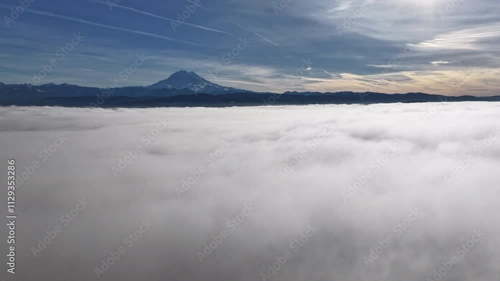 Mount Rainier Above a Vast Cloud Layer Under a Blue Sky Mount Rainier Above a Vast Cloud Layer Under a Blue Sky
