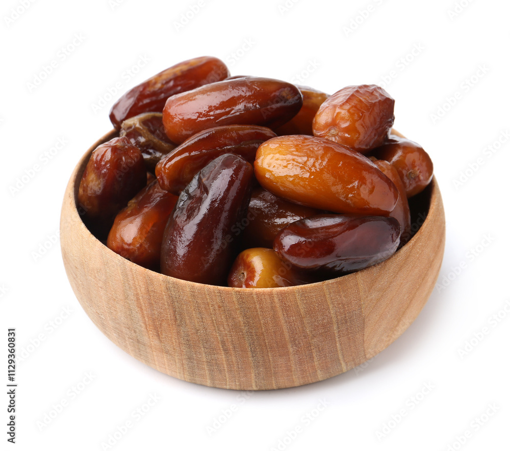 Tasty sweet dried dates in wooden bowl isolated on white Tasty sweet dried dates in wooden bowl isolated on white