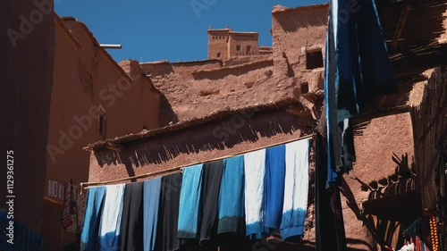 blue laundry drying in clay city Aït Benhaddou, Morocco, Africa