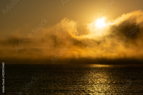 A fog bank over the Atlantic Ocean at dawn