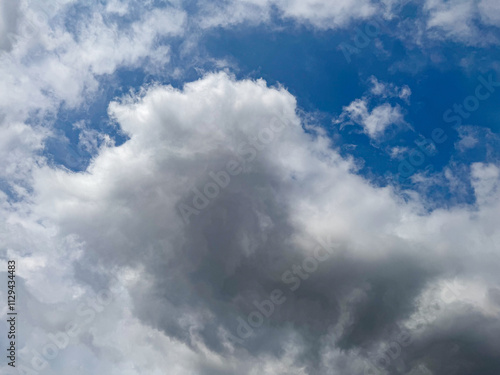 Big clouds floating in the sky Forming together into rain clouds in the afternoon