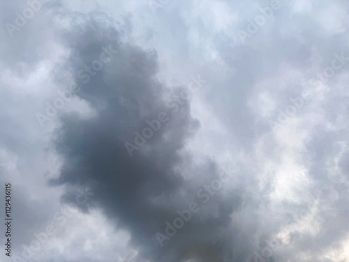 Big clouds floating in the sky Forming together into rain clouds in the afternoon