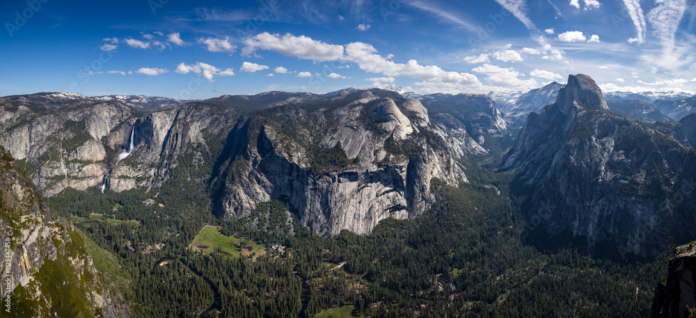 Panorama from glacier point over Yosemite valley with half dome, royal arches and Yosemite falls